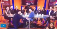 Okan Bayülgen'in canlı yayımlanan programında bir kadın üstünü çıkararak sahneye atladı